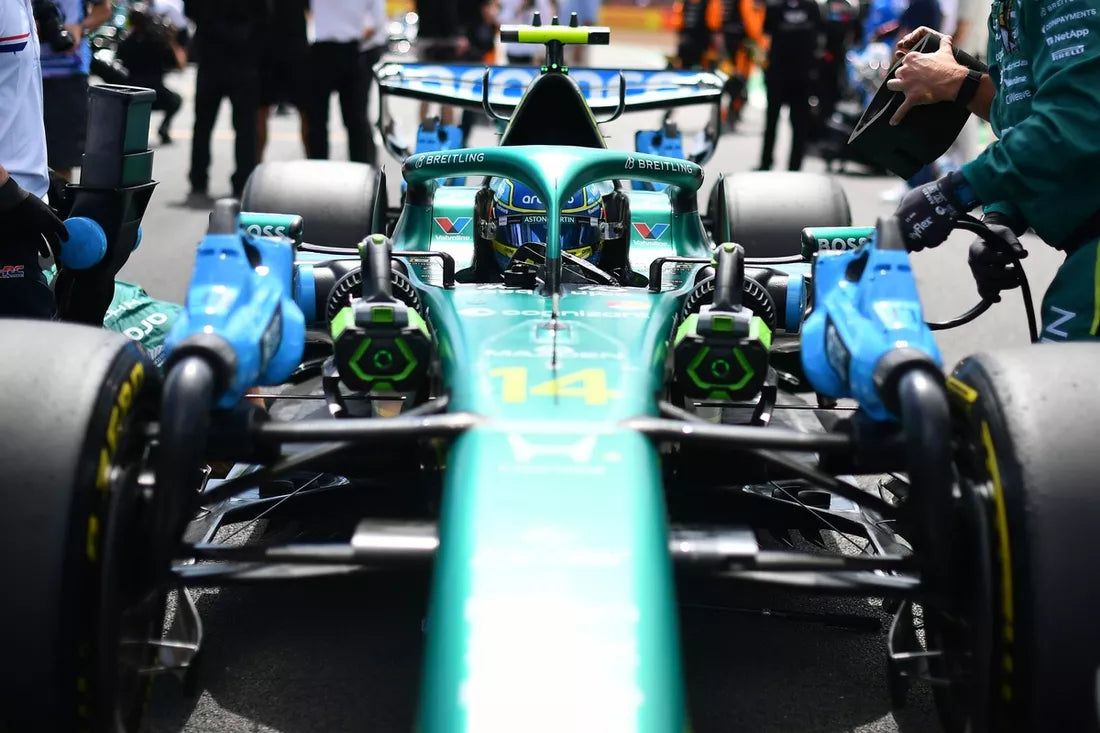 Alonso and Aston Martin score points in tough Sepang race