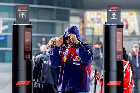 Lewis Hamilton celebrates first Ferrari win after tough debut season