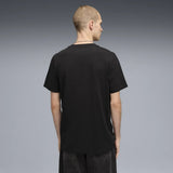 Black T-shirt back view worn.